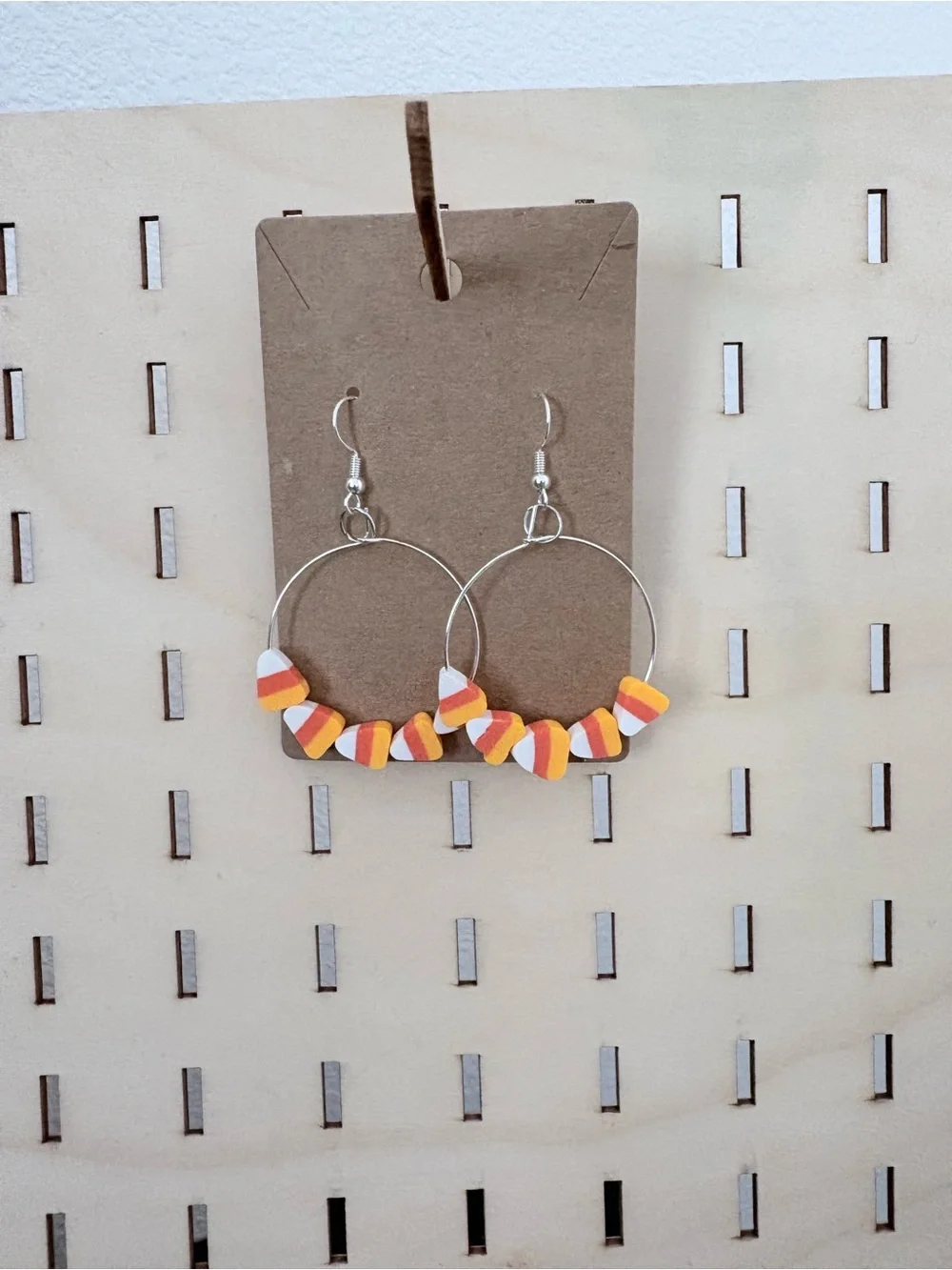 Handcrafted candy corn poly clay beaded hoop earrings